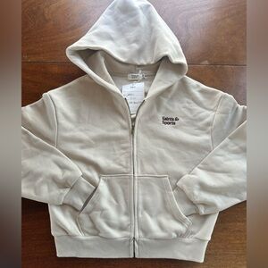 Saints & Sports Sample Zip Luxury Athleisure Hoodie Cream Embroidered Logo | Med